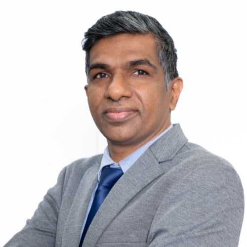 Professional headshot of Sridhar Nallapeta, Chief of Staff and Vice President at Leadsoc Technologies Private Limited, wearing formal business attire with a composed, professional expression against a clean, neutral background.