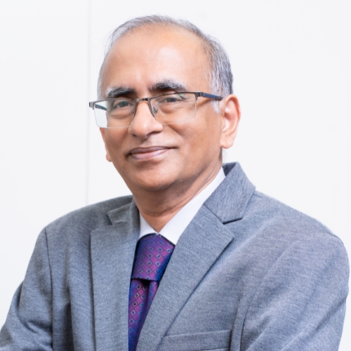 Professional headshot of M. N. Kumar, Chief Strategy Officer at Leadsoc Technologies Private Limited, wearing formal business attire, smiling confidently against a plain light background.